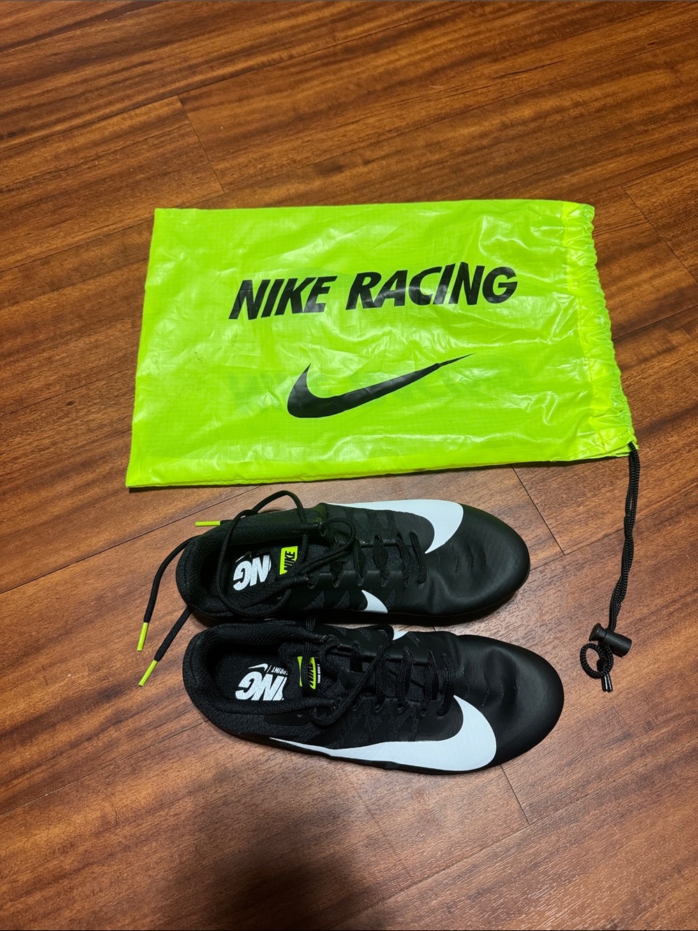 Women’s Black Athletic Track Shoes with White Swoosh